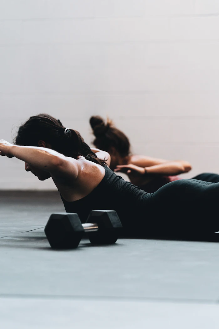 Athlete stretching on the studio floor